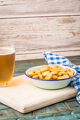 Image showing Tasty lupins and glass of beer