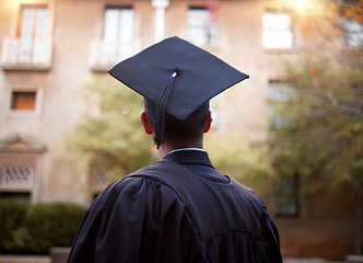 Image showing Thinking graduate, man or vision on university campus, college event or school graduation ceremony and future goals. Graduation cap, robe or student with education, learning or employment opportunity