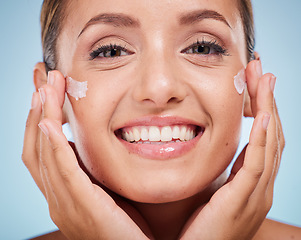 Image showing Beauty, face and cream with skincare and woman with hands frame, glow and shine with cosmetic moisturizer against studio background. Healthy skin, lotion and portrait smile with cosmetics mockup.