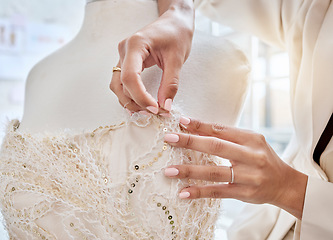 Image showing Hands, design and woman designer with needle for dress, pattern and details while fabric in her studio. Fashion designer, hand and creative businesswoman working on luxury, classic and elegant wear