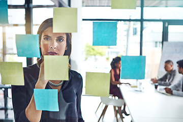 Image showing Thinking, planning or business woman for schedule idea, creative or marketing review in meeting. Corporate, post it or manager on glass for data analysis, strategy or project management