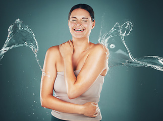 Image showing Beauty, skin and skincare water splash on woman cleaning body for hygiene and hydration isolated in a studio background. Self care, wellness and female dermatology for young beautiful adult