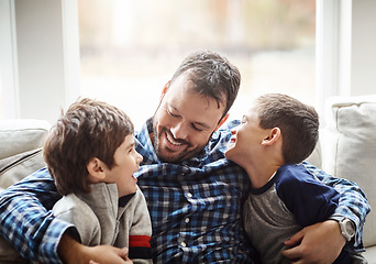 Image showing Family home, boys and dad with hug on sofa for conversation, love or bonding for childhood development. Happy people, relax or joke together in living room for fun, happiness or quality time in house