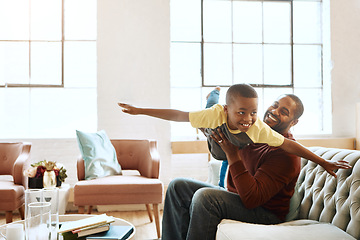 Image showing Airplane, game and father with son on a sofa, playing and bonding in their home together. Love, family and parent enjoy relationship with smiling boy, fly and fun in the living room on the weekend