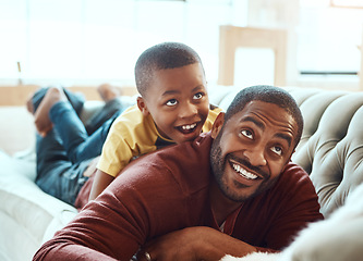 Image showing Happy family, father and son on sofa, relax and play, happy and smile while bond in their home. Love, parent and child excited, playful and cheerful In a living room, joy and enjoy weekend together