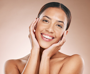 Image showing Skincare, beauty and, portrait of woman with hands on face and smile on studio background in Atlanta. Makeup, glamour and luxury skin care with facial massage, natural spa treatment on happy woman.