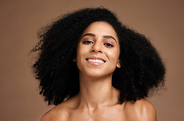 Image showing Black woman, portrait and happiness for skincare wellness, natural curly hair care and cosmetics dermatology in brown background studio. African girl, smile and luxury self care beauty or body glow