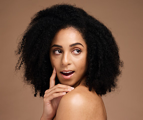 Image showing Face, beauty skincare and thinking black woman in studio isolated on a brown background. Makeup, cosmetics and surprised or shocked young female model with idea for spa facial treatment and wellness.