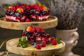 Image showing Chocolate cake with berries on top