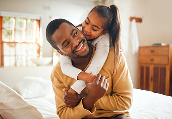 Image showing Family, child hug father with love and care at home, happiness with relationship, trust and affection. Black man, young girl smile and happy people with embrace, wellness with bonding together