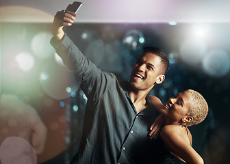 Image showing Couple of friends, phone or selfie on party dance floor in nightclub event, bokeh disco or birthday celebration. Smile, happy or bonding people on mobile photography, social media or profile picture