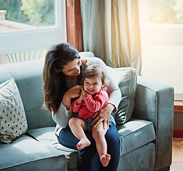 Image showing Relax, happy and smile with mother and baby on sofa for bonding, quality time and child development. Growth, support and trust with mom and daughter in family home for health, connection and care