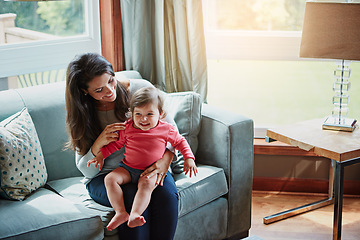 Image showing Relax, happy and smile with mother and baby on sofa for bonding, quality time and child development. Growth, support and trust with mom and daughter in family home for health, connection and care