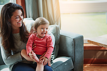 Image showing Relax, happy and smile with mother and baby on sofa for bonding, quality time and child development. Growth, support and trust with mom and daughter in family home for health, connection and care