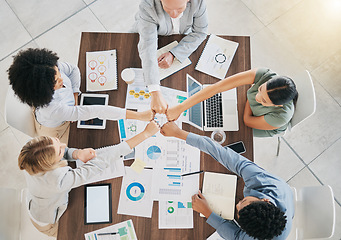 Image showing Business people, hands and top view success of team celebration, motivation and support in meeting, trust or collaboration. Diversity workers, hands together and startup goals, vision and partnership