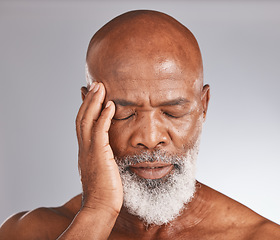 Image showing Elderly black man, headache and pain with stress and mental health against studio background. Depression, skin and senior man face with healthcare problem, retirement and anxiety with migraine