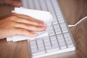 Image showing Keyboard, cleaning and hands wipe with cloth for hygiene, dust or bacteria removal. Cleaning service, spring cleaning or cleaner with antibacterial wipes to stop spread of covid on desktop technology