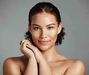 Image showing Health, natural and black woman skincare portrait for beauty cosmetic and glow treatment campaign. Healthy body care of model happy with beautiful freckles on face in gray studio background.