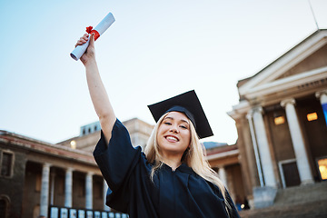 Image showing Education, graduation and portrait of woman at university, college and academic campus with diploma certificate. Celebration, graduate ceremony and girl student with success, victory and achievement