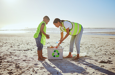 Image showing Recycle, plastic and mother with child in beach cleaning education of sustainability, green environment or eco friendly ocean. Mother or volunteer family with box at sea for pollution or earth day