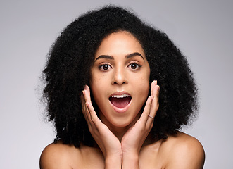 Image showing Face skincare, wow and surprised black woman in studio isolated on gray background. Makeup cosmetics, portrait and female model shocked after spa facial treatment for healthy skin, beauty or wellness