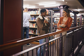 Image showing Students, college library and women talking about books, education and learning together at university. Friends having conversation about knowledge, studying and research to study with scholarship