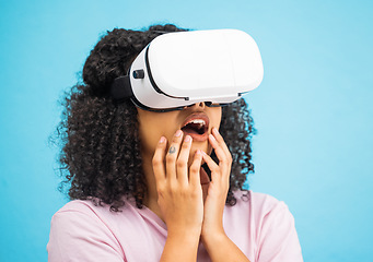 Image showing Black woman with virtual reality glasses, surprise and wow, VR and metaverse, futuristic tech isolated on blue background. Gaming, web and augmented reality, ux in studio and future technology mockup