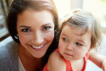 Image showing Happy, playful and portrait of a mother with a baby for bonding, quality time and relaxation. Smile, happiness and face of a mom playing with a child for care, comfort and carefree parenthood