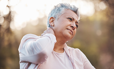 Image showing Exercise, neck pain and senior woman outdoor, fitness and injury while training, wellness and health. Mature female, elderly lady and injured in nature, broken or massage joint for workout or healthy