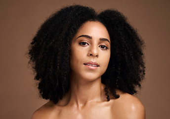 Image showing Face portrait, beauty skincare and black woman in studio isolated on a brown background. Cosmetics, makeup and young female model with glowing, healthy and flawless skin after spa facial treatment.