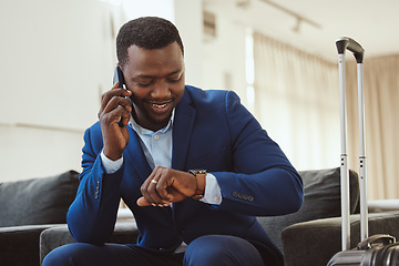 Image showing African businessman in hotel, on smartphone call and checking wrist watch for time. Corporate professional in Chicago, young black entrepreneur and listening to voice message in luxury airport