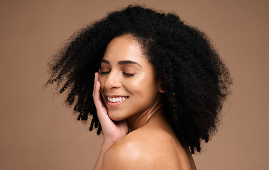 Image showing Hair, afro beauty and happy black woman with natural cosmetics, facial makeup and luxury healthcare on studio background. Dermatology, spa salon and African model face with clean shampoo hair care