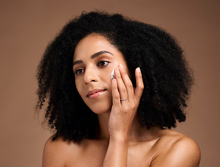 Image showing Face cream, black woman beauty for face, makeup and sunscreen product for wellness, luxury beauty and body cosmetics. Female model, facial lotion and natural skincare, aesthetic and healthy collagen