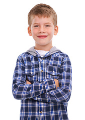 Image showing Arms crossed, smile and portrait of a child with pride isolated on a studio background. Happy, fashion and stylish boy model with confidence, happiness and young on a white background in studio