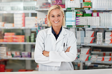 Image showing Doctor, pharmacy worker and happy portrait ready for medical support, wellness industry and standing pharmaceutical drug store. Woman, nurse smile and healthcare medicine or pharmacist headshot