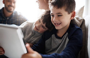 Image showing Laughing kids, bonding or tablet for movies streaming, esports or social media on house or family home living room. Smile, happy or fun brother on digital technology, children learning or team gaming