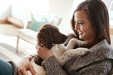 Image showing Pet, smile and dog mom in a home on a living room couch with dog bonding with care. Animal love, puppy and person with happiness at home with a smile from animals on lounge sofa together feeling calm