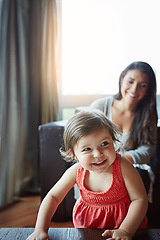 Image showing Cute, happy and baby playing with mother, bonding and relaxing in the living room of a house. Relax, smile and playful child laughing with happiness during quality time in their family home with mom