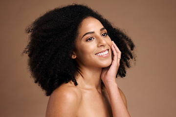 Image showing Black woman, studio and happy with beauty, makeup and cosmetic wellness with hands, face glow or afro hair. Model, soft skin and facial cosmetics, self care and self love by brown studio background