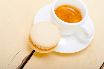 Image showing colorful macaroons with espresso coffee