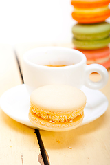 Image showing colorful macaroons with espresso coffee