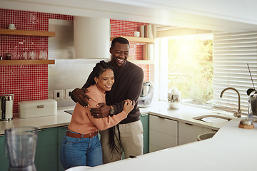 Image showing Black couple, happy home and love while together with care and happiness in a marriage with commitment and care. Young man and woman laughing while in the kitchen to bond in their house or apartment