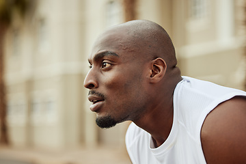 Image showing Runner, fitness or tired black man running in cardio exercise, workout or sports training in city. Fatigue, face or focused healthy African athlete breathing or thinking of target, vision or goals