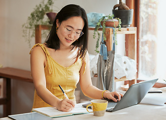 Image showing Startup, Asian or business woman writing in notebook for SEO research, online communication idea or blog content search. Happy, smile or girl relax for social media, data planning or website review