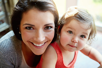 Image showing Portrait, mother and girl with smile, happiness and bonding in living room, weekend and relax together. Motherhood, mama and daughter in lounge, cheerful and positive with care, loving and family