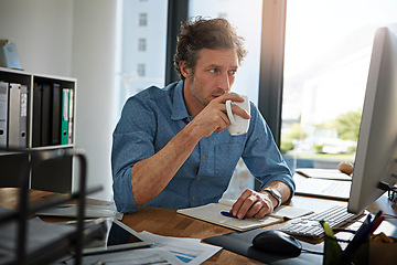Image showing Coffee, thinking and computer with a business man at work in his office for future growth or research. Idea, tea and internet with a male employee working or planning online using a desktop