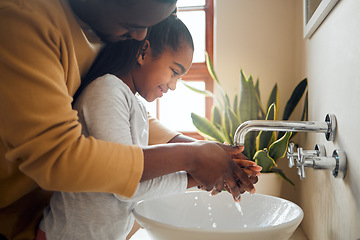 Image showing Black family, father and child washing hands with clean water in home bathroom. Man teaching girl while cleaning body part for safety, healthcare and bacteria for learning about health and wellness