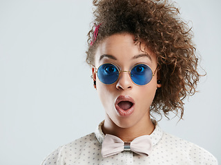 Image showing Black woman, wow and surprise on her face with sunglasses isolated against a studio white background. Portrait of shock, wtf and open mouth by female excited for fashion sale, deal or discount