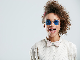 Image showing Sunglasses, smile and face of woman on a white background for summer, casual and trendy fashion style. Creative, beauty and zoom of happy girl isolated in studio with cosmetics, makeup and confidence