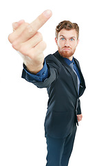 Image showing Angry, rude and portrait of a businessman with a middle finger isolated on a white background. Stressed, frustrated and employee with an offensive hand sign and body language on a studio backdrop